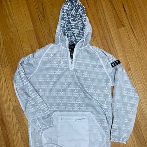 ULT GHOST TRIANGLE PACKABLE ANORAK JACKET ** FOLDS INTO A 6 INCH X 6 INCH SIZE**